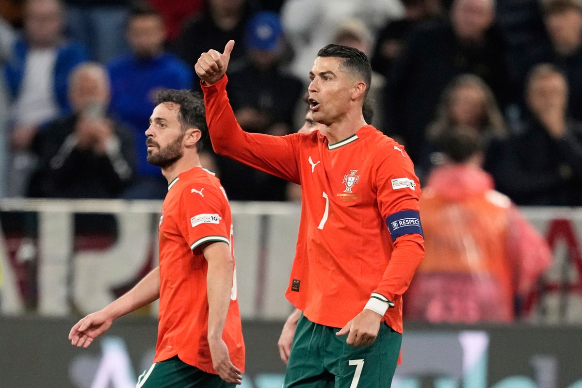 cristiano-ronaldo-shrugs-off-pre-match-scuffle-with-pitch-invader-to-secure-win-against-germany