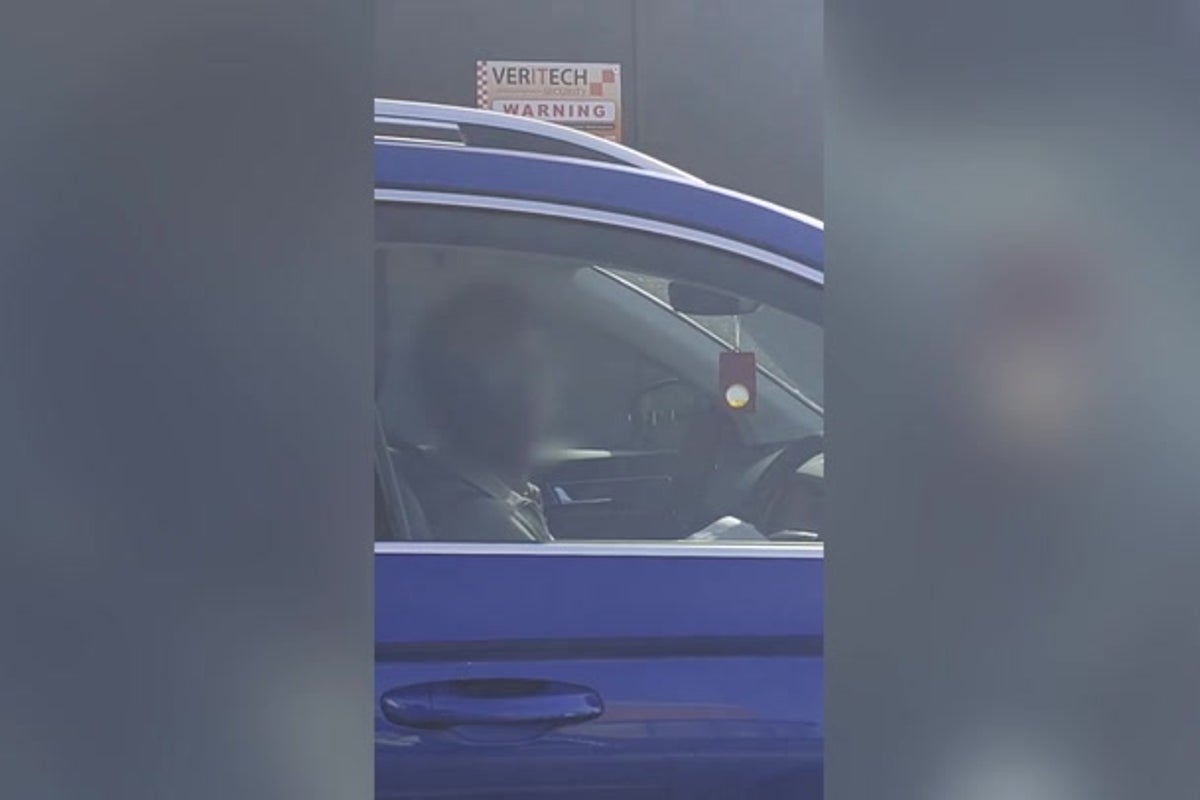 driver-paying-for-parking-ticket-behind-wheel-immediately-fined-again