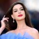 anne-hathaway-cradles-baby-bump-at-the-odyssey-world-premiere